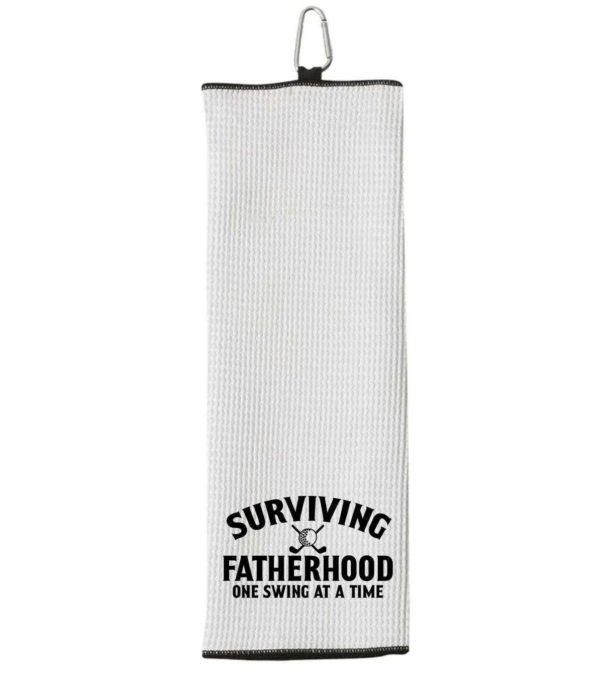 Surviving Fatherhood One Swing at a Time Tri-fold Golf Towel with Clip 100% Microfiber Waffle Weave Black White Gift Idea for Golfer Men