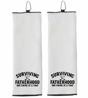 Surviving Fatherhood One Swing at a Time Tri-fold Golf Towel with Clip 100% Microfiber Waffle Weave Black White Gift Idea for Golfer Men